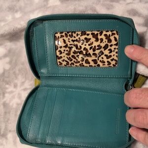 Genuine Leather wristlet, external pocket, zip, 3 card holders, ID, long pocket